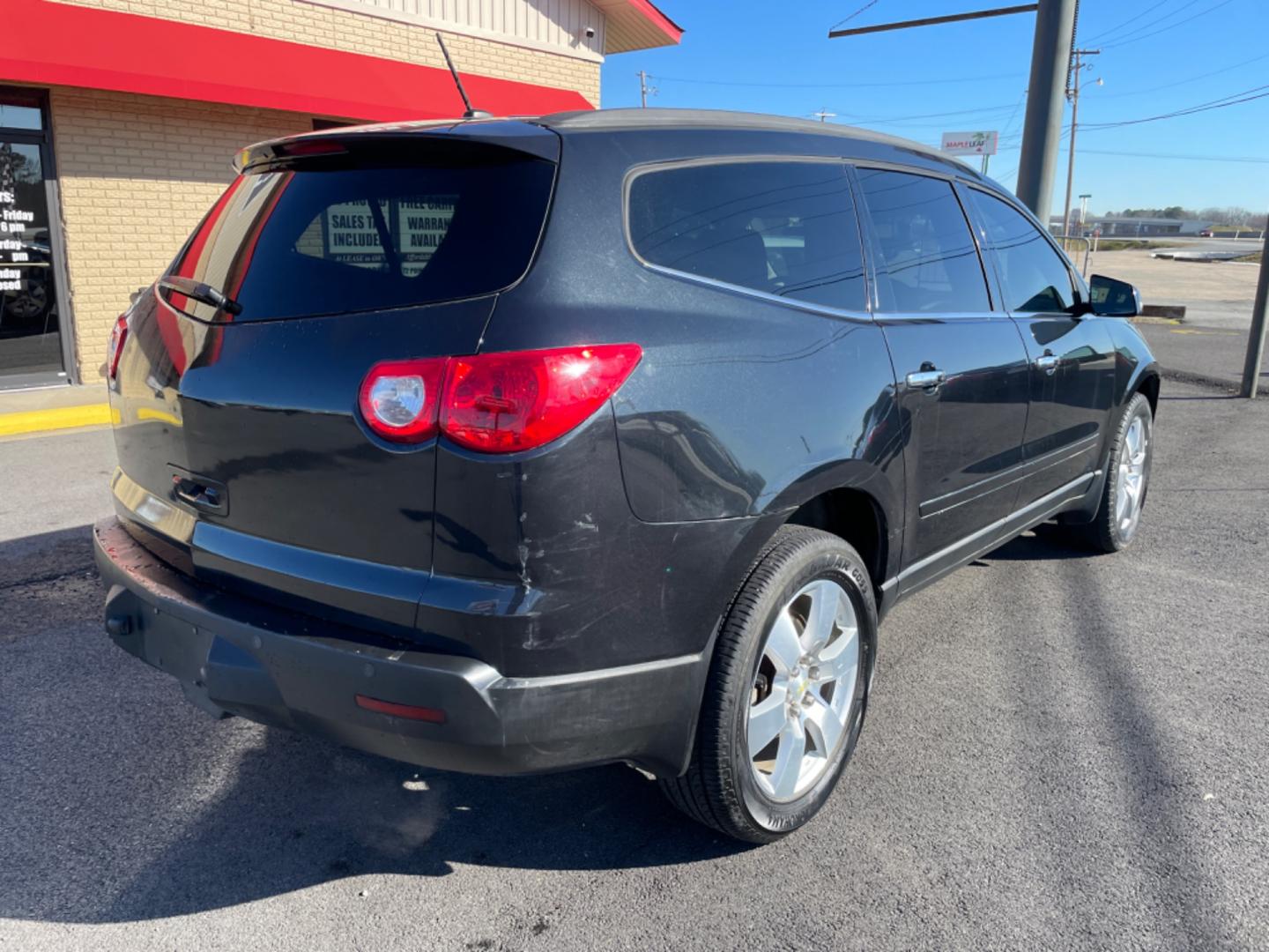 2012 Black Chevrolet Traverse (1GNKRGED7CJ) with an V6, 3.6 Liter engine, Auto, 6-Spd w/Shft Ctrl transmission, located at 8008 Warden Rd, Sherwood, AR, 72120, (501) 801-6100, 34.830078, -92.186684 - Photo#7